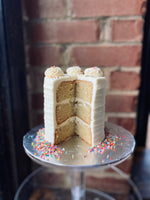 Load image into Gallery viewer, Vanilla cake with buttercream frosting.
